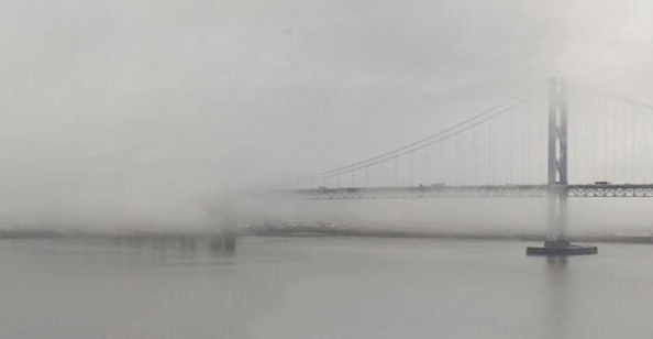 Edinburgh bridge over the Forth covered in fog