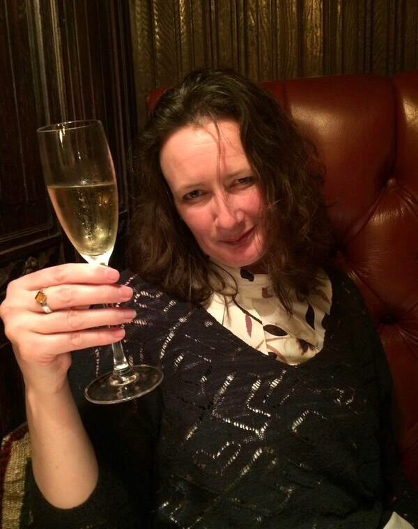 Deborah enjoying a glass of Veuve Clicquot at the Witchery in Edinburgh